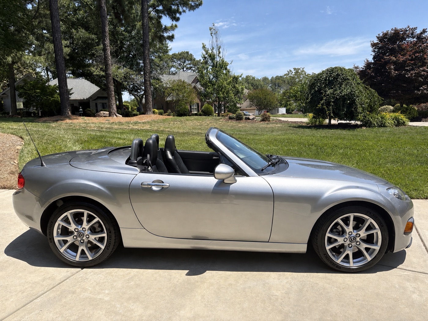 Silver 2014 Mazda Miata Grand Touring parked on a driveway