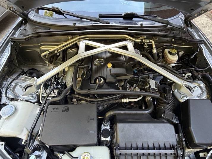 Completed strut brace install, full engine bay view